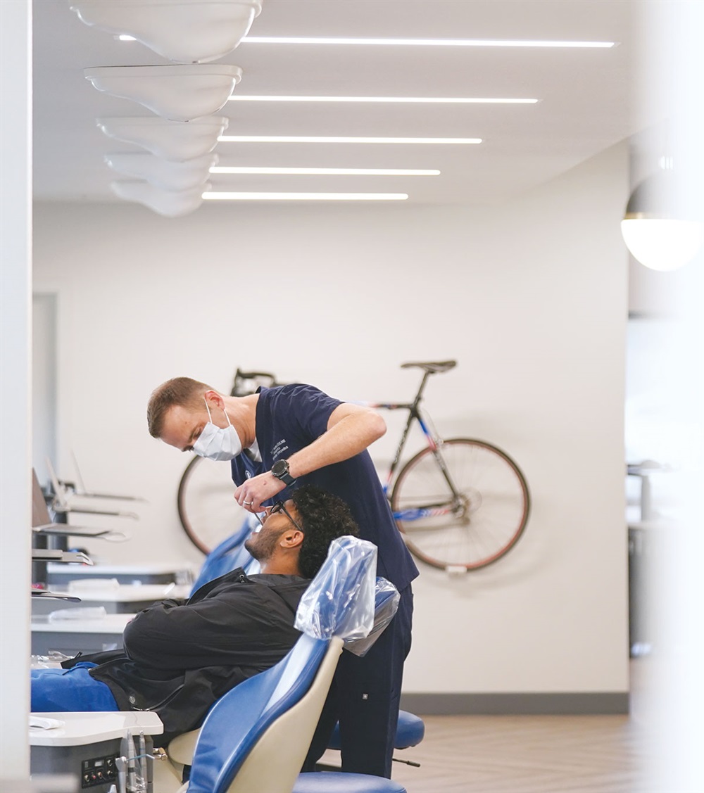 Dr. Wesslen with a patient in the treatment bay