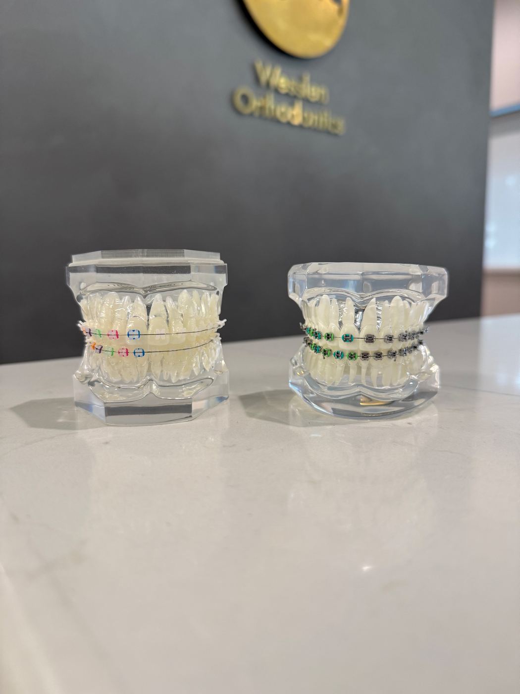 Custom LightForce braces models in translucent and metal materials